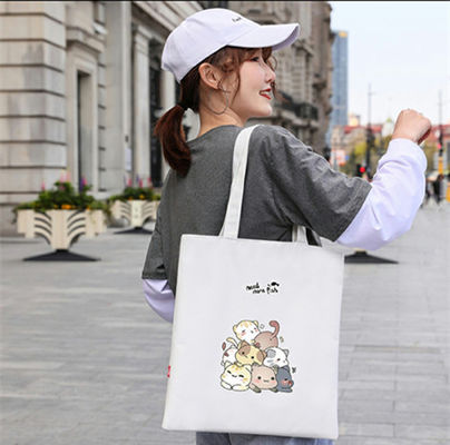 2023 شعار مخصص وحجم قماش مطبوع عضوي كاليكو حقيبة تسوق قماش حمل سيدة حقيبة تسوق حقيبة مدرسية للأطفال